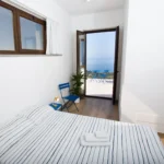 Camera con letto matrimoniale e vista sul mare, accesso diretto alla terrazza – Villa Giardino degli Ulivi, Sicilia